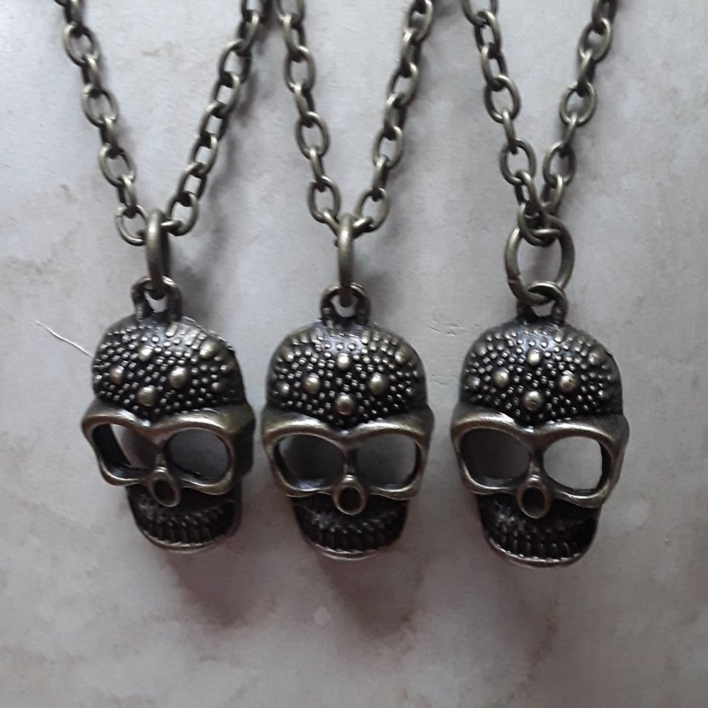 skull head necklace